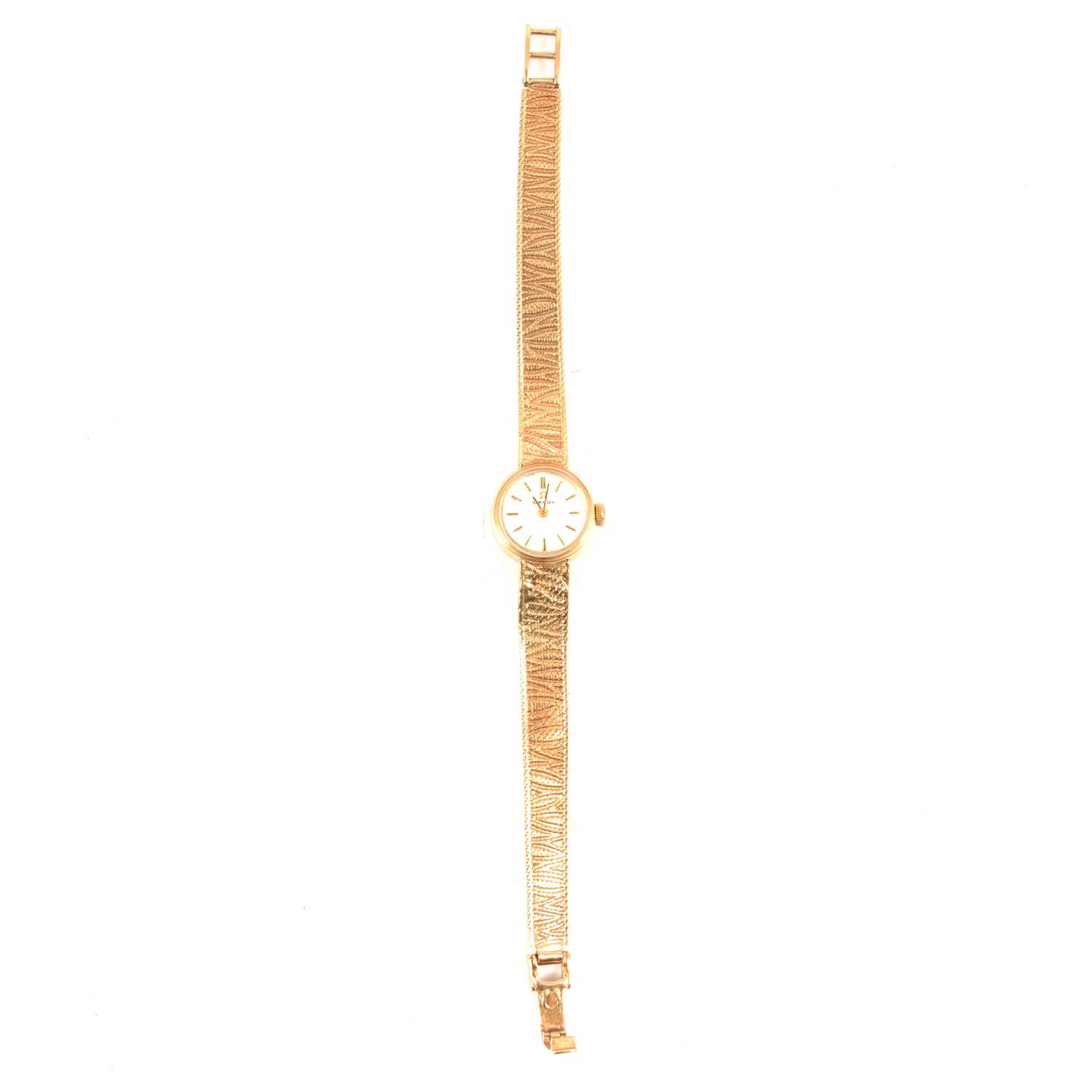Omega - a lady's 9 carat gold bracelet watch.