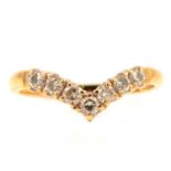 A diamond wishbone ring,