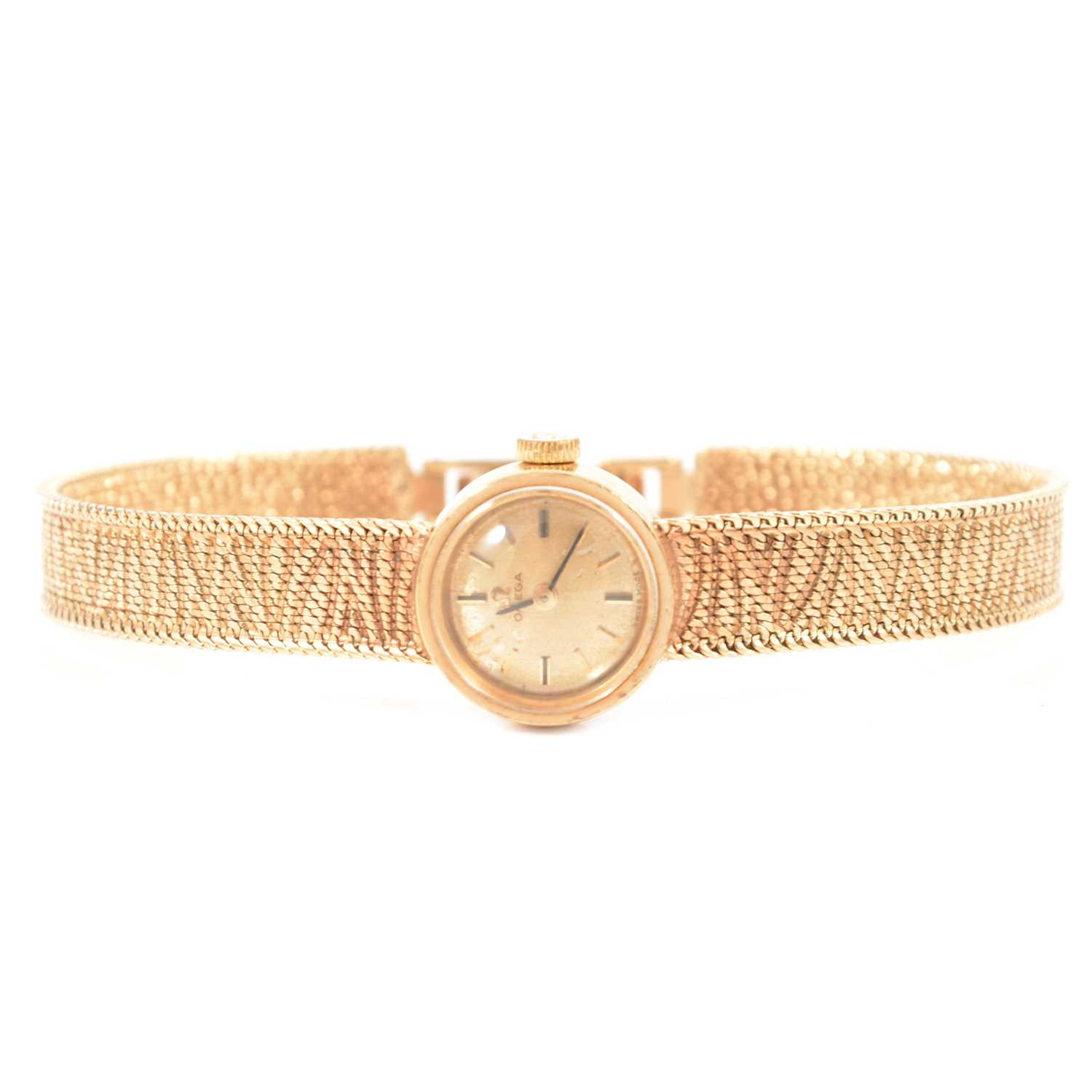 Omega - a lady's 9 carat yellow gold bracelet watch.