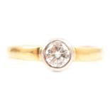 A diamond solitaire ring,