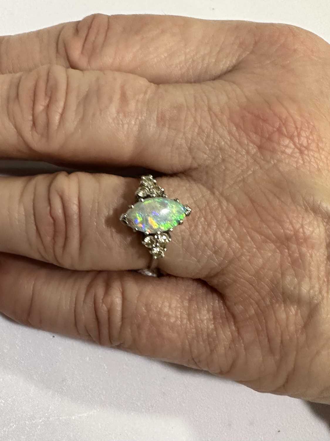 A marquise opal and diamond ring. - Image 3 of 5