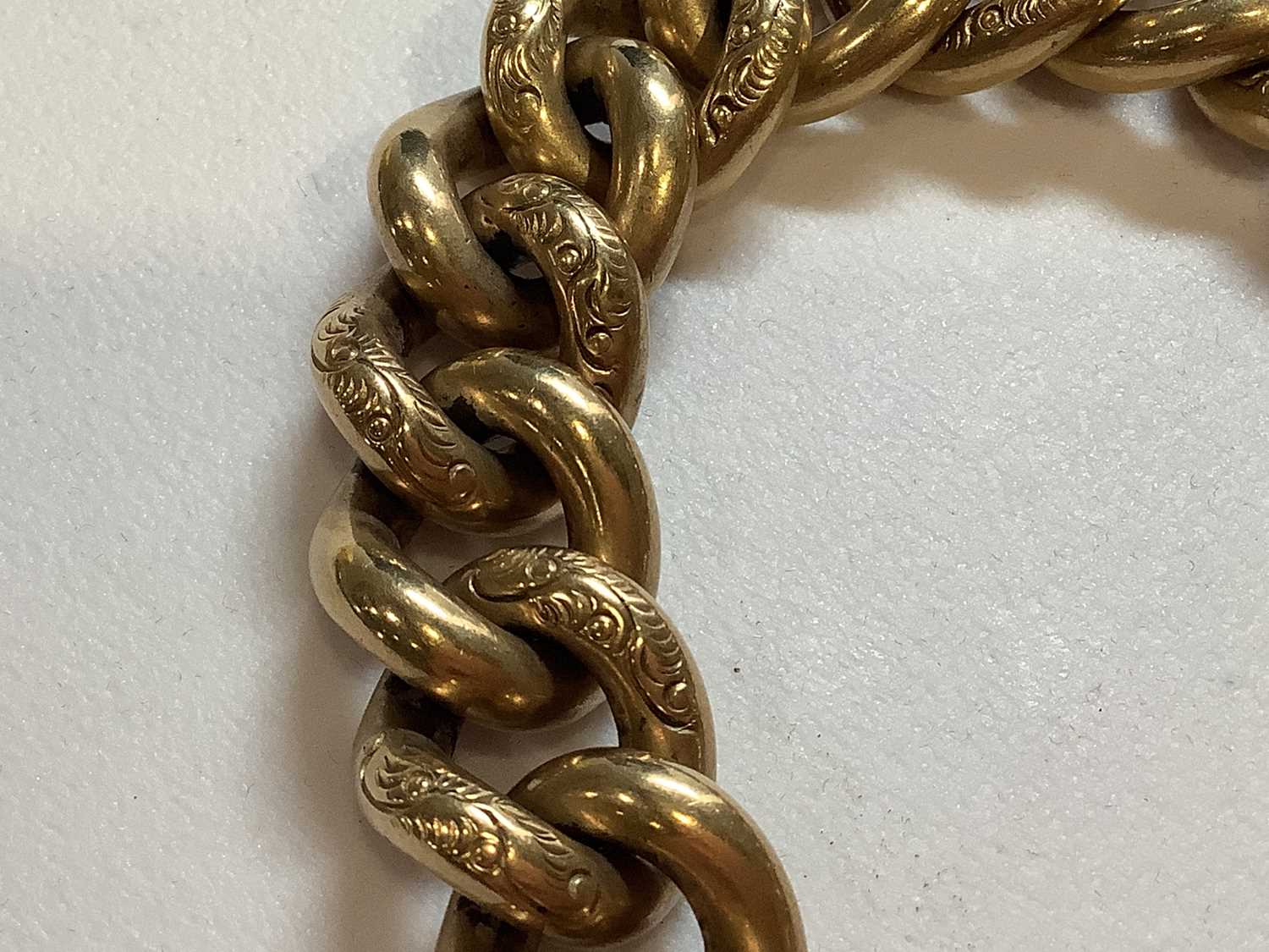 A 9 carat yellow gold solid curb link bracelet. - Image 3 of 8