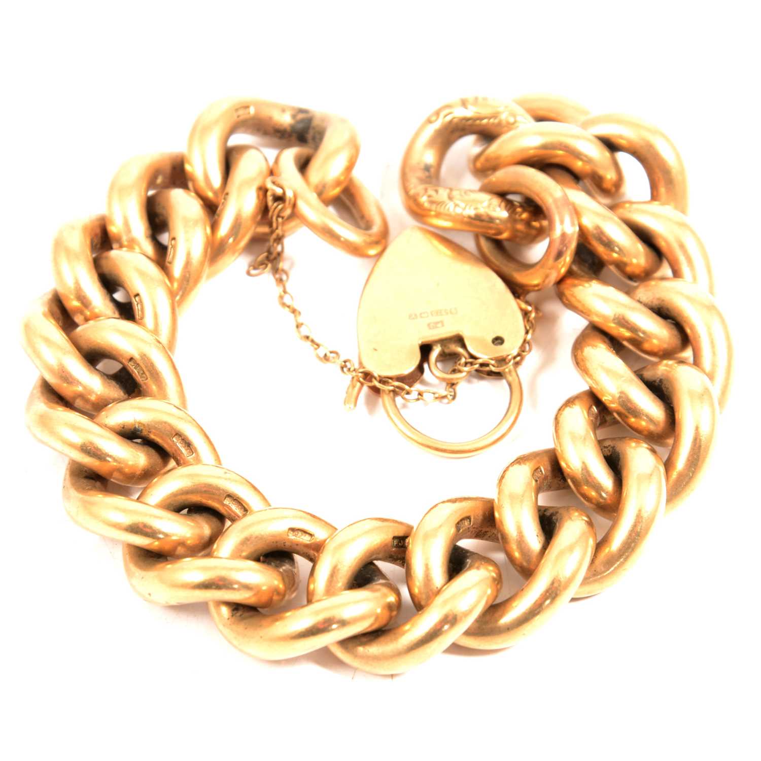 A 9 carat yellow gold solid curb link bracelet.