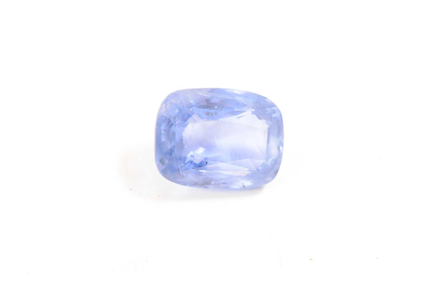 A loose blue sapphire stone - 12.25 carats. - Image 3 of 8