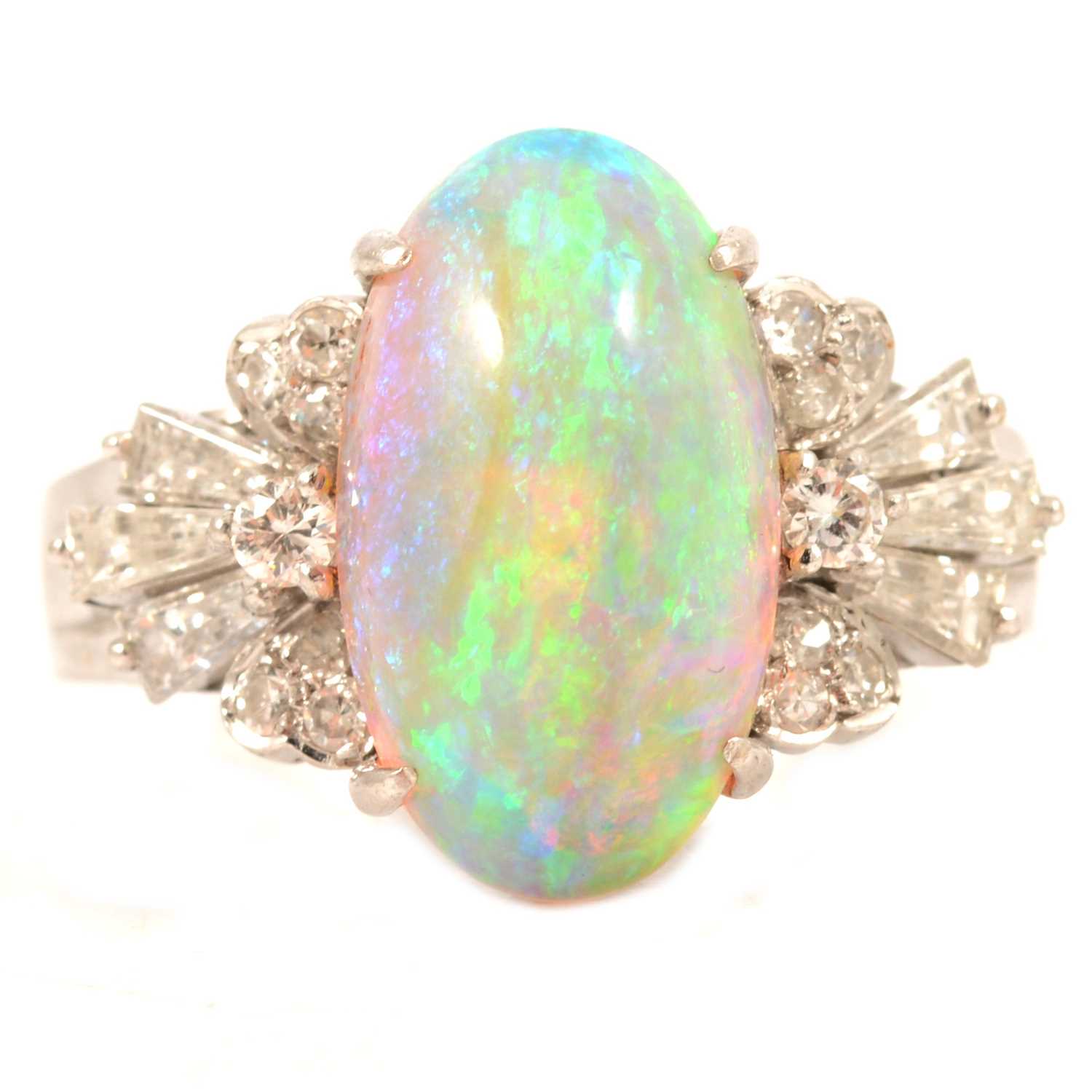 An opal and diamond dress ring.