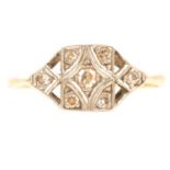 An Art Deco diamond cluster ring.