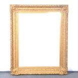 Large Victorian gilt gesso frame, replaced mirror glass,