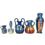 Five Flemish earthenware vases and jugs.