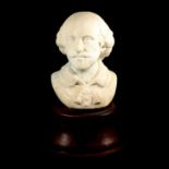 Marble bust of Shakespeare, on a wooden socle