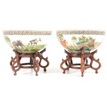 Pair of Chinese porcelain bowls, on wooden stands