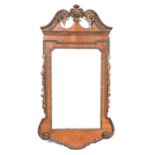 George II style walnut and parcel gilt wall mirror,