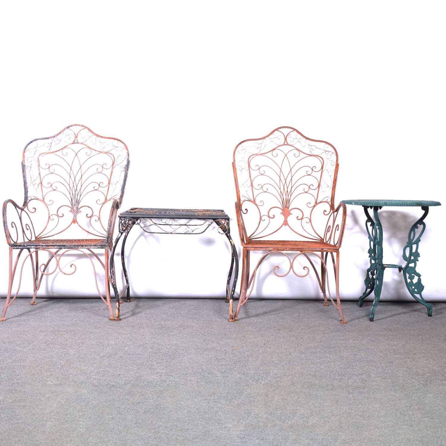 Pair of wirework garden chairs, similar square table and a cast metal circular table.