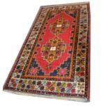 Two Persian woolen rugs