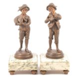 After Kessler, a pair of French bronzed spelter figures of musicians,
