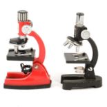 Two Watson & Barnet microscopes, and two student microscopes.