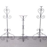 Pair of standard pricket candlesticks and a plant stand,