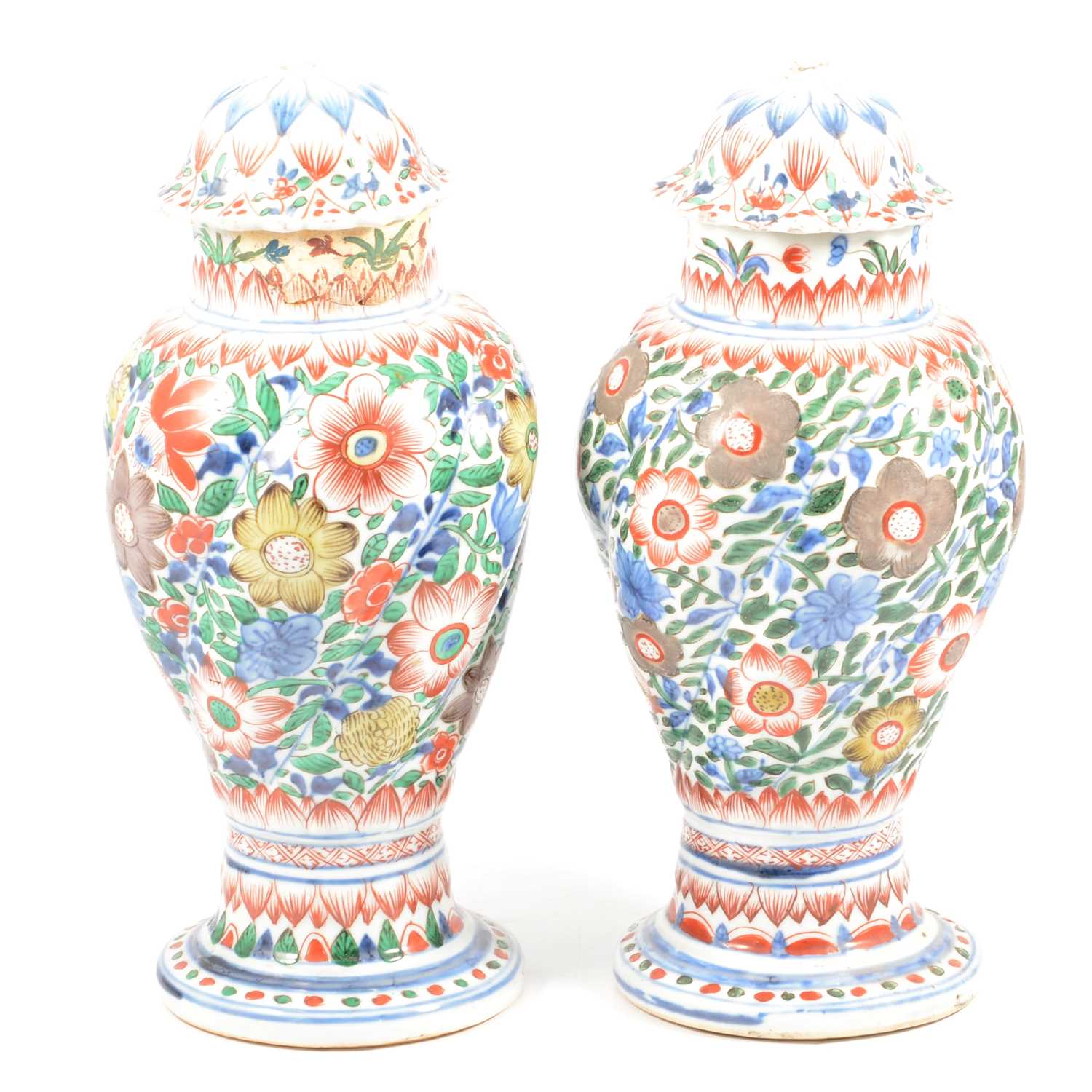Pair of Chinese porcelain covered vases, clobbered decoration