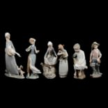 Fourteen Lladro and Nao figurines.