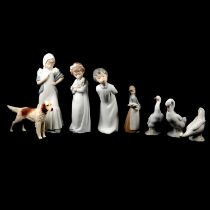 Eight pottery figurines