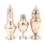 Small silver caster, Goldsmiths & Silversmiths Co Ltd, London 1903, and two others.