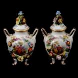 Pair of Continental porcelain lidded vases,