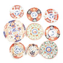 Quantity of Imari chargers and plates