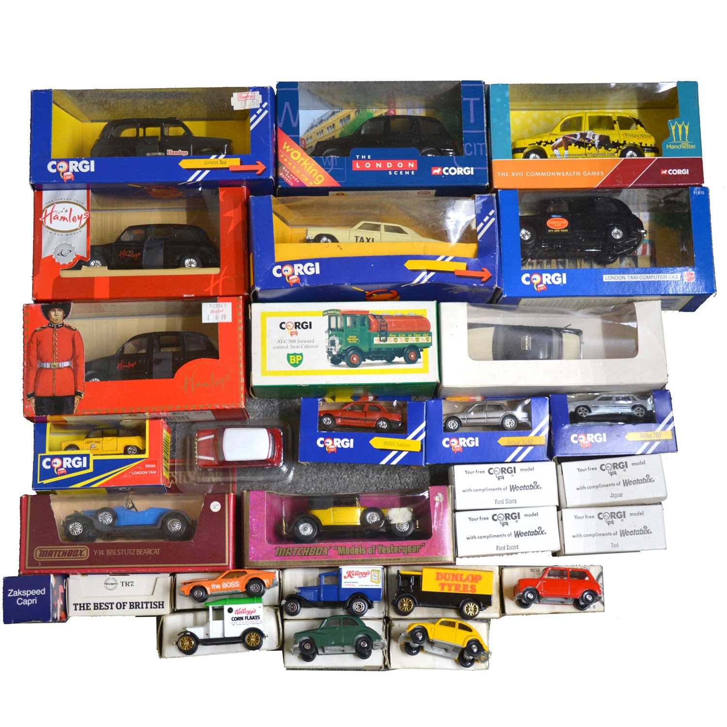 Twenty-nine die-cast model vehicles, including Corgi and Matchbox, boxed.