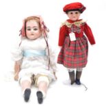 Two Armand Marseille bisque head dolls.