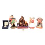 Four Royal Doulton figures, a Moorcroft enamel pill box, and another pill box
