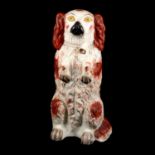 Large 19th century Staffordshire figure of a pipe smoking spaniel