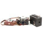 Three vintage film cameras, including Praktica LTL 35mm