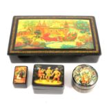 Four USSR painted paper mache boxes,