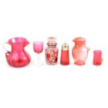 A collection of cranberry glass, Victorian and later