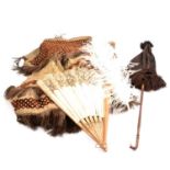 A Victorian hand stitched cape, parasol, fan and feather.