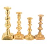 Quantity of Victorian and later brass candlesticks.
