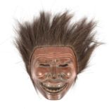Indonesian carved wood and hair tribal mask