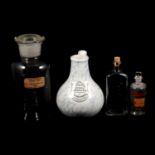 Various pharmacist's medicine bottles; Inhaler; Sulphur jar.