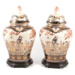 A pair of Chinese pottery covered vases
