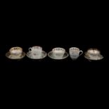 Collection of English porcelain tea bowls, tea cups, and saucers