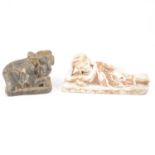 Asian carved hardstone reclining figure and another of an elephant,