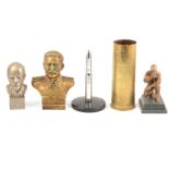 Metal busts of Stalin and Lenin, golfing figure, trench art, etc