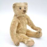 Steiff teddy bear, c1905/10, black button eyes, jointed limbs.