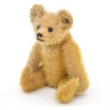 Small Steiff teddy bear, c1920, black button eyes, jointed limbs