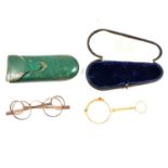 Victorian silver-framed glasses, and a gilt metal pair of spectacles