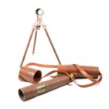 A B.C. & Co four draw military issued telescope and custom made tripod.