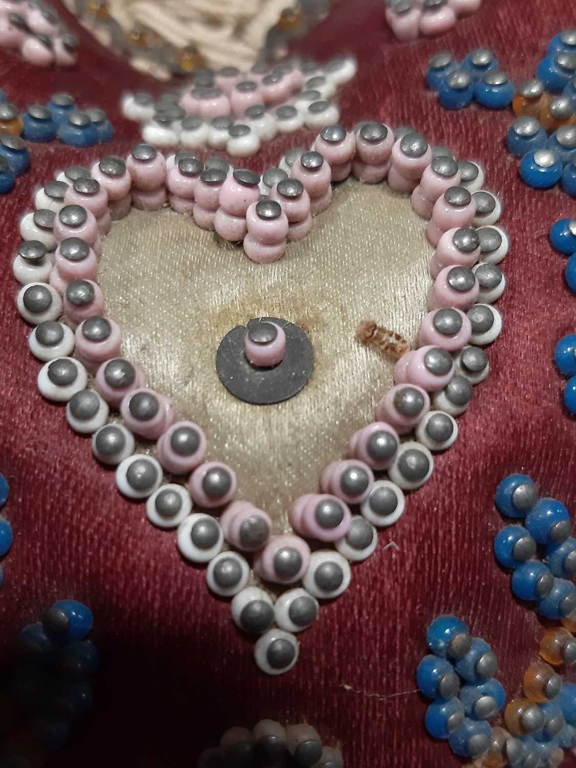 A heart shaped beaded pin cushion, Royal Horicultural Society medal, baby's rattle and other silver. - Image 6 of 6