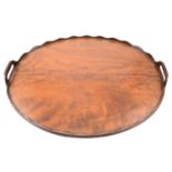 A mahogany oval tea tray and a whip rack.