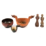 Two carved and painted dragon bowls, two figures, and another bowl