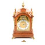 A Winterhalder & Hofmeier oak cased bracket clock.