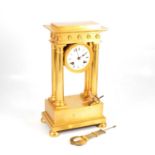 French gilt metal portico clock,